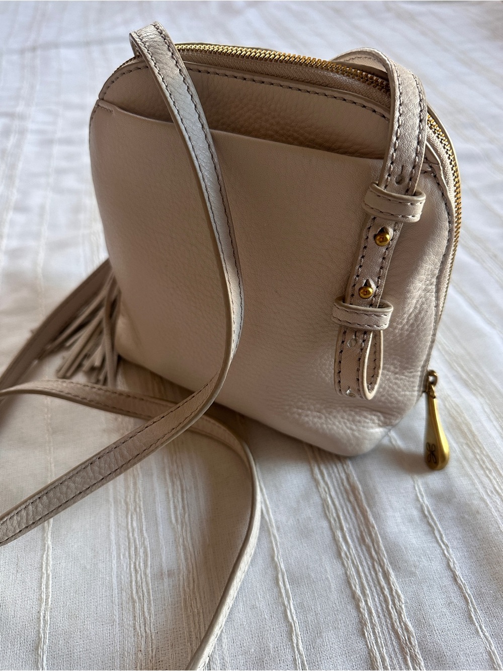HOBO Ivory Nash Crossbody Bag | Pebbled Leather Tassel Gold Hardware - Picture 9 of 16